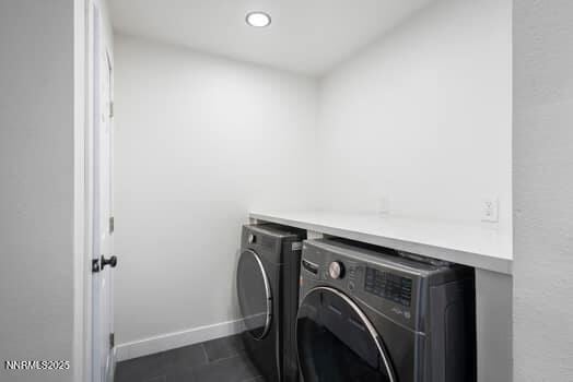 1203 Stanford Way, Sparks, NV 89431 - washroom with washer and dryer, recessed lighting, and dark tile patterned flooring