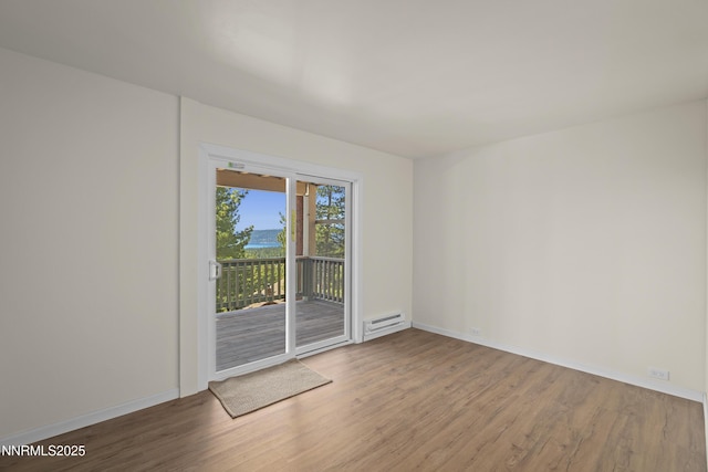 400 Fairview Blvd Unit 20, Incline Village, NV 89451 - empty room featuring wood finished floors and a baseboard radiator