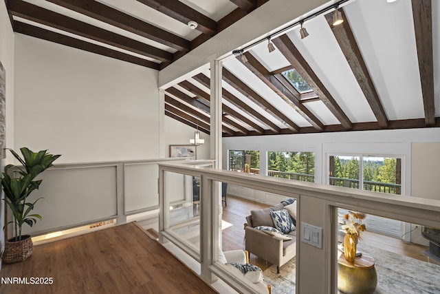 400 Fairview Blvd Unit 20, Incline Village, NV 89451 - corridor with a skylight, wood finished floors, a decorative wall, and a chandelier