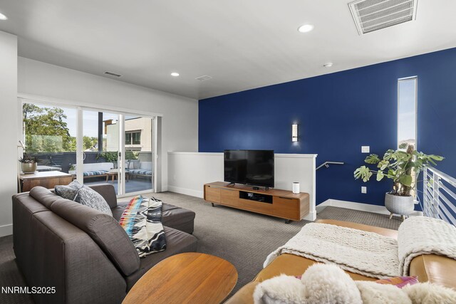 1402 Tonopah St, Reno, NV 89509 - carpeted living area with baseboards and recessed lighting