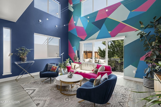 1402 Tonopah St, Reno, NV 89509 - living area featuring a towering ceiling and wood finished floors