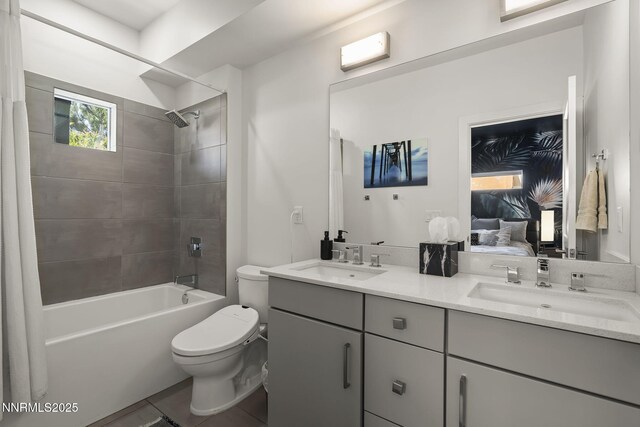 1402 Tonopah St, Reno, NV 89509 - ensuite bathroom featuring double vanity, shower / washtub combination, and tile patterned floors