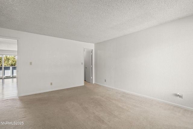 3948 Clear Acre Ln Unit 262, Reno, NV 89512 - carpeted empty room with a textured ceiling