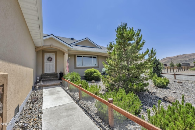 150 Brandon Ranch Ct, Reno, NV 89510 - property entrance featuring stucco siding and a mountain view