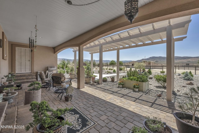 150 Brandon Ranch Ct, Reno, NV 89510 - view of patio / terrace featuring a pergola, a mountain view, and area for grilling