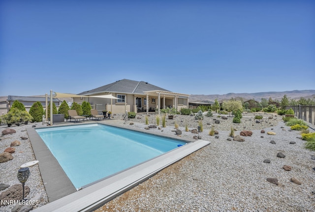 150 Brandon Ranch Ct, Reno, NV 89510 - view of pool featuring a patio and a mountain view