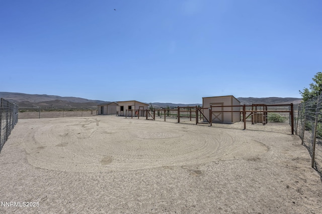 150 Brandon Ranch Ct, Reno, NV 89510 - view of yard with a storage shed and a mountain view