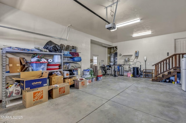 150 Brandon Ranch Ct, Reno, NV 89510 - garage with a garage door opener and freestanding refrigerator