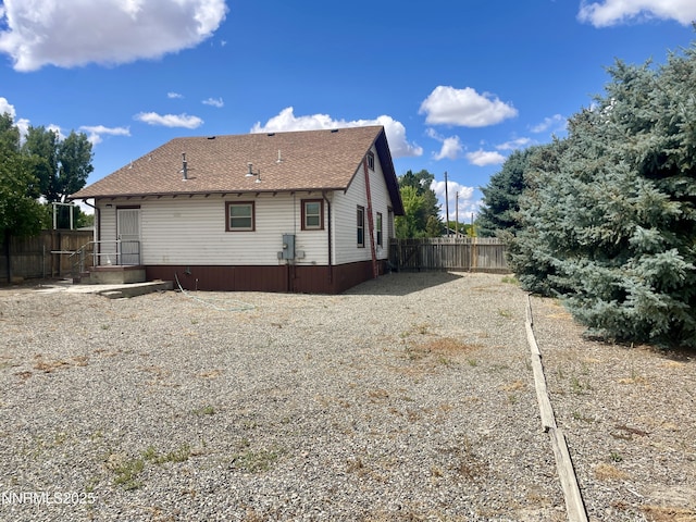 77 Lay St, Winnemucca, NV 89445 - rear view of house featuring a shingled roof