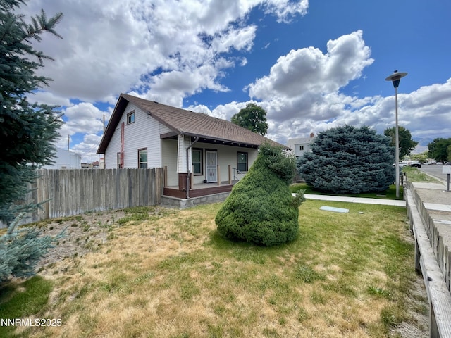 77 Lay St, Winnemucca, NV 89445 - view of property exterior with a porch