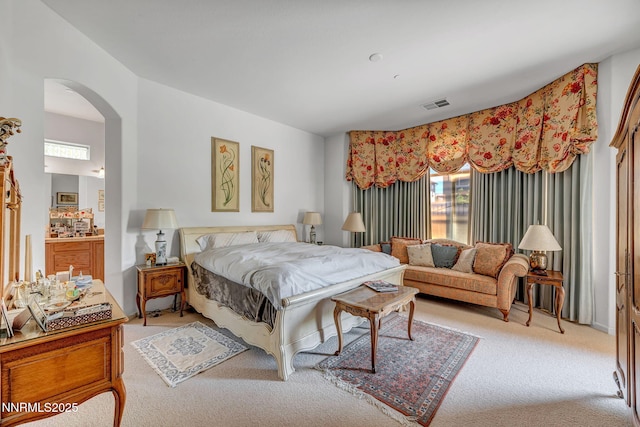 9900 Wilbur May Pkwy Unit 2001, Reno, NV 89521 - bedroom featuring light carpet and arched walkways