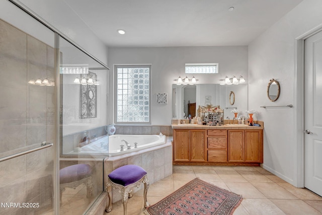 9900 Wilbur May Pkwy Unit 2001, Reno, NV 89521 - bathroom with a bath, double vanity, tile patterned floors, a chandelier, and a stall shower