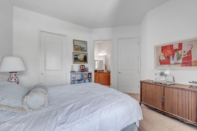 9900 Wilbur May Pkwy Unit 2001, Reno, NV 89521 - bedroom with light colored carpet and connected bathroom