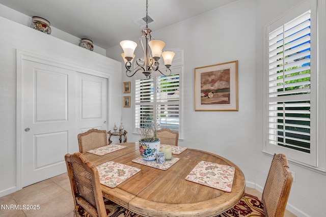 9900 Wilbur May Pkwy Unit 2001, Reno, NV 89521 - dining room with a chandelier and light tile patterned flooring