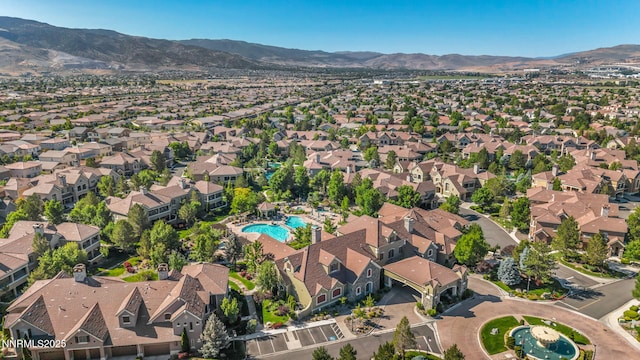 9900 Wilbur May Pkwy Unit 2001, Reno, NV 89521 - aerial view of property and surrounding area featuring a mountainous background and nearby suburban area