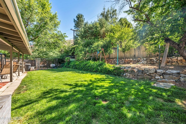 700 Highland St, Carson City, NV 89703 - fenced backyard with a patio area