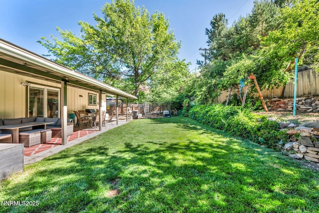 700 Highland St, Carson City, NV 89703 - fenced backyard featuring an outdoor living space and a patio