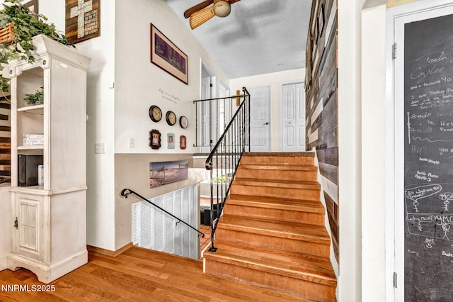 700 Highland St, Carson City, NV 89703 - stairs with wood finished floors and ceiling fan