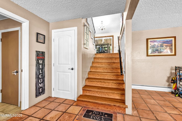 700 Highland St, Carson City, NV 89703 - stairway featuring a textured ceiling and a chandelier