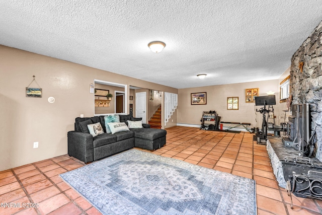 700 Highland St, Carson City, NV 89703 - living area featuring stairs, tile patterned flooring, and a textured ceiling