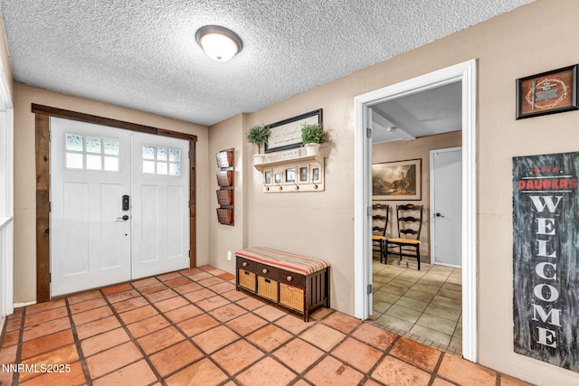 700 Highland St, Carson City, NV 89703 - entrance foyer featuring a textured ceiling and light tile patterned floors