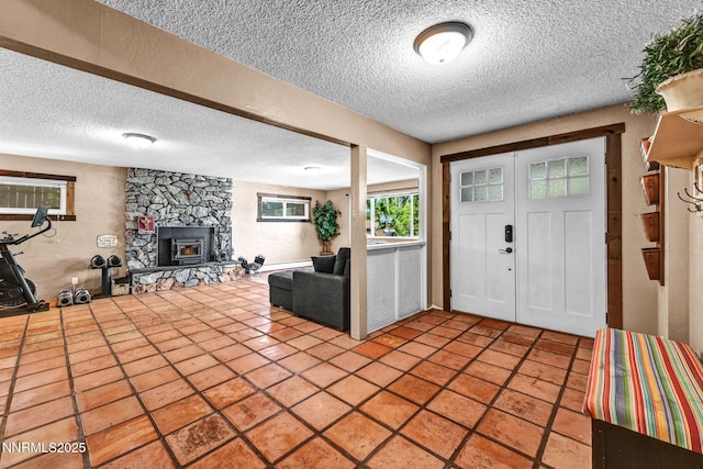 700 Highland St, Carson City, NV 89703 - foyer entrance with a textured ceiling and a fireplace