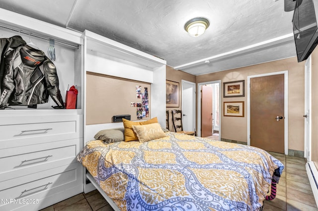 700 Highland St, Carson City, NV 89703 - tiled bedroom with baseboard heating