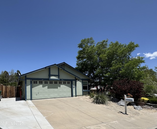 6559 Fall River Cir, Reno, NV 89523 - view of front of home with driveway and a garage