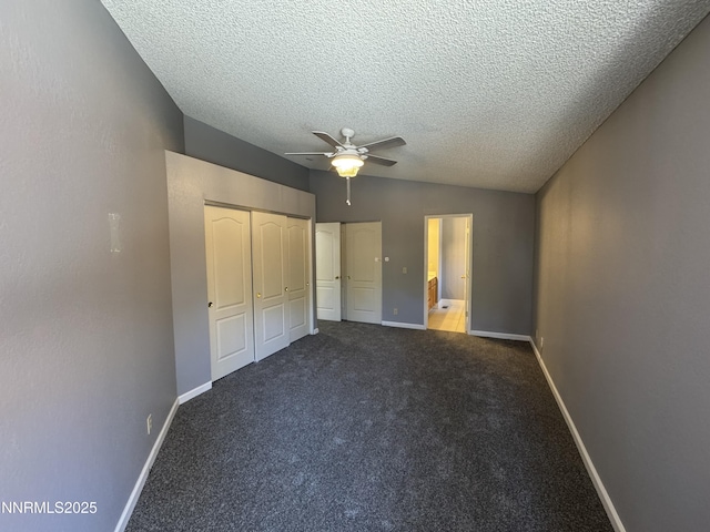 6559 Fall River Cir, Reno, NV 89523 - unfurnished bedroom with a textured ceiling, carpet flooring, a closet, ceiling fan, and vaulted ceiling