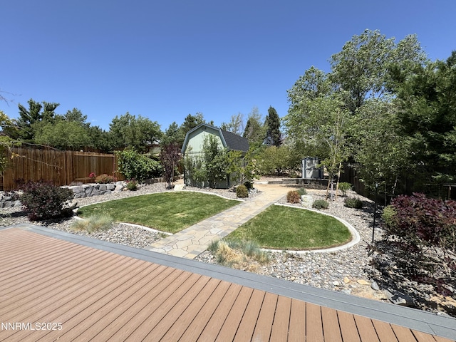 6559 Fall River Cir, Reno, NV 89523 - wooden deck featuring a storage shed and a fenced backyard