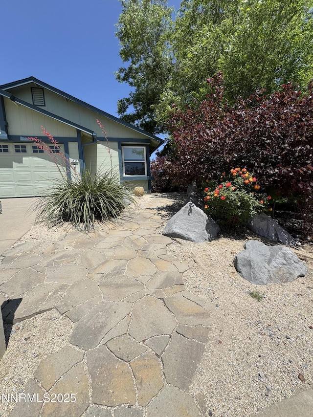 6559 Fall River Cir, Reno, NV 89523 - view of patio / terrace with a garage