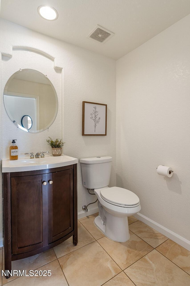 7436 Baysheen Ct, Sparks, NV 89436 - half bath with vanity and tile patterned floors