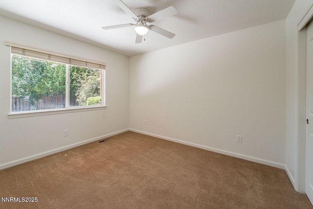 7436 Baysheen Ct, Sparks, NV 89436 - unfurnished room with light colored carpet and ceiling fan
