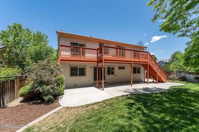 7436 Baysheen Ct, Sparks, NV 89436 - rear view of house with a fenced backyard, a wooden deck, a patio, and stairs