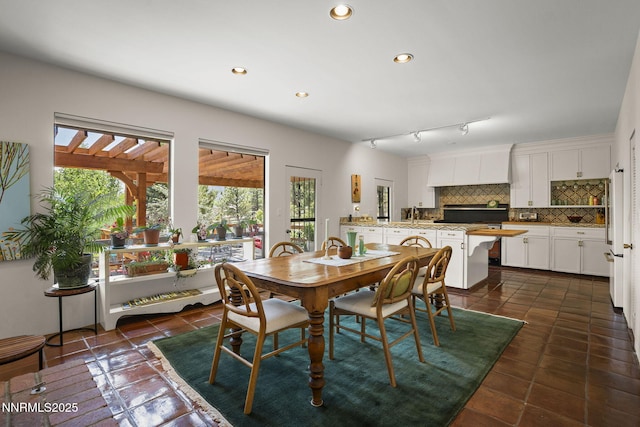 2548 Jacks Valley Rd, Genoa, NV 89411 - dining area with recessed lighting and dark tile patterned flooring