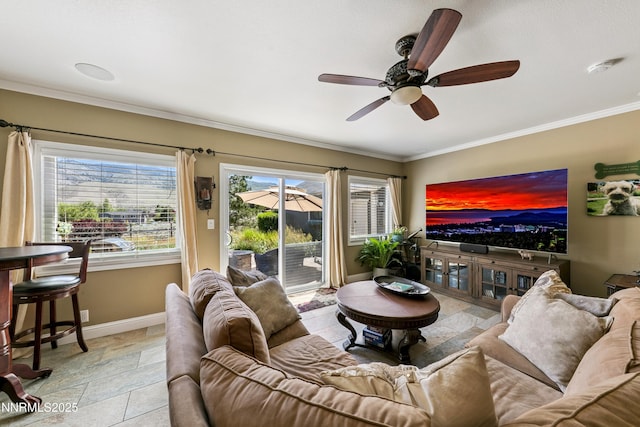 545 Mogul Mountain Dr, Reno, NV 89523 - living room featuring ceiling fan, ornamental molding, and stone tile floors
