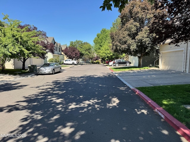 4066 Snowshoe Ln, Reno, NV 89502 - view of asphalt street with curbs and a residential view