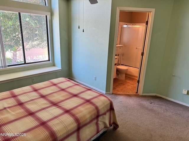 4066 Snowshoe Ln, Reno, NV 89502 - carpeted bedroom with multiple windows and ensuite bath