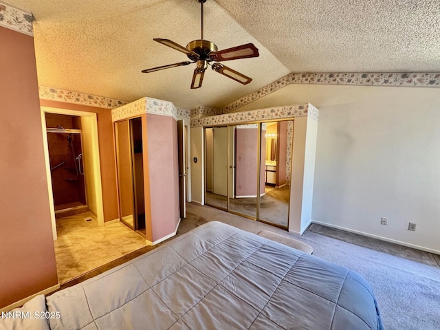 4066 Snowshoe Ln, Reno, NV 89502 - carpeted bedroom featuring lofted ceiling, a textured ceiling, and a ceiling fan