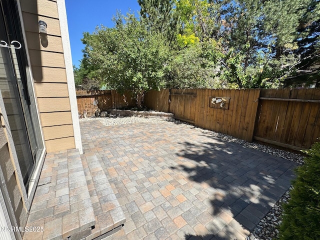 4066 Snowshoe Ln, Reno, NV 89502 - fenced backyard featuring a patio area