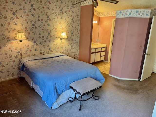 4066 Snowshoe Ln, Reno, NV 89502 - bedroom with wallpapered walls, carpet floors, and ensuite bathroom