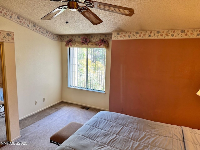4066 Snowshoe Ln, Reno, NV 89502 - bedroom with a textured ceiling, carpet floors, and a ceiling fan