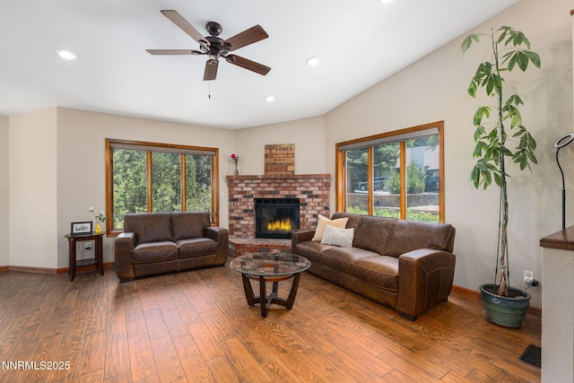 3597 Skyline View Dr, Reno, NV 89509 - living room with wood-type flooring, ceiling fan, a fireplace, and recessed lighting