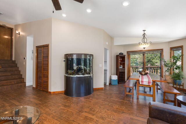 3597 Skyline View Dr, Reno, NV 89509 - dining area featuring ceiling fan, wood finished floors, stairs, and recessed lighting