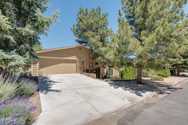 3597 Skyline View Dr, Reno, NV 89509 - view of front of house featuring concrete driveway and an attached garage