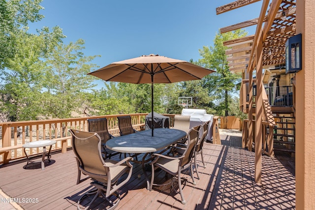 3597 Skyline View Dr, Reno, NV 89509 - wooden deck with stairway and outdoor dining space