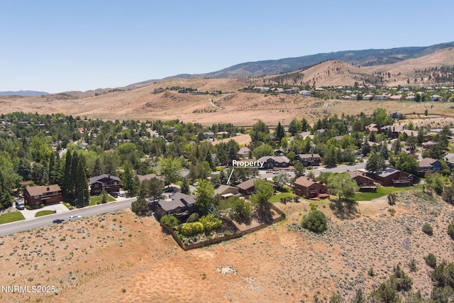 3597 Skyline View Dr, Reno, NV 89509 - aerial perspective of suburban area with a mountainous background