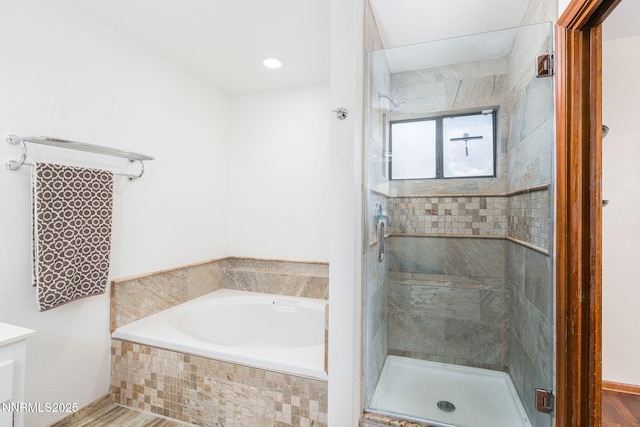 3597 Skyline View Dr, Reno, NV 89509 - bathroom with a garden tub, a stall shower, and vanity
