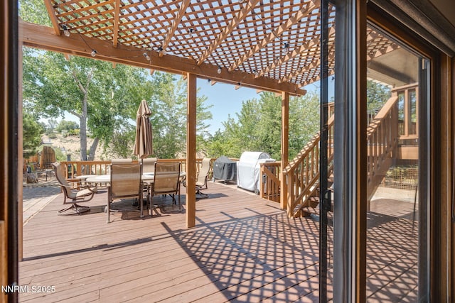 3597 Skyline View Dr, Reno, NV 89509 - wooden terrace featuring outdoor dining space, a grill, and a pergola