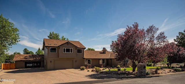 15045 Heathcliff Dr, Reno, NV 89511 - view of front facade with an attached garage and decorative driveway